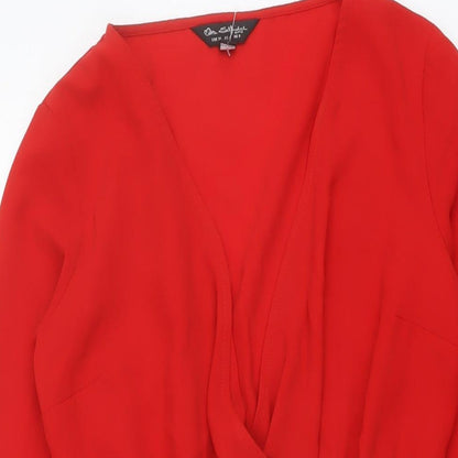 Close-up detail of Miss Selfridge women’s red polyester a-line, size UK 8, v-neck pullover