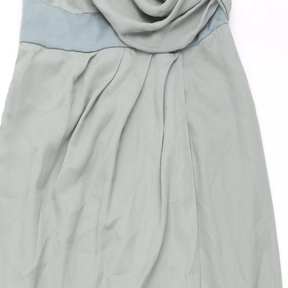 Close-up detail of ASOS women’s green polyester ball gown, size UK 4, v-neck button