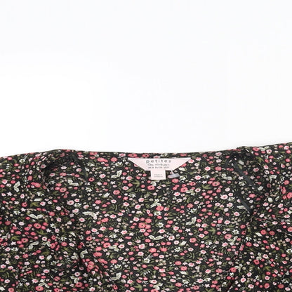 Close-up detail of Miss Selfridge women’s multicoloured floral polyester wrap blouse, size UK 6, v-neck - frill