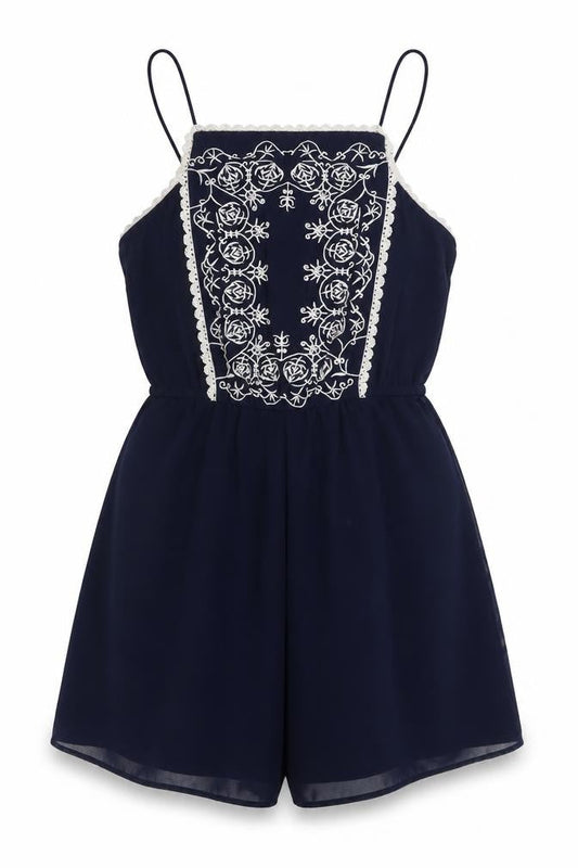 Front view of Miss Selfridge women’s blue geometric polyester playsuit one-piece, size UK 6, 3-inch leg button