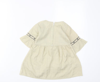 Back view of Attitude girls’ beige fair isle cotton a-line, size 18, months crew neck zip - embroidered