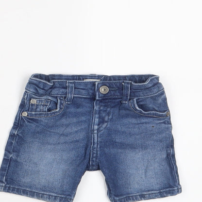 Close-up detail of River Island boys’ blue cotton cropped trousers, size 9-12, months zip - adjustable waist