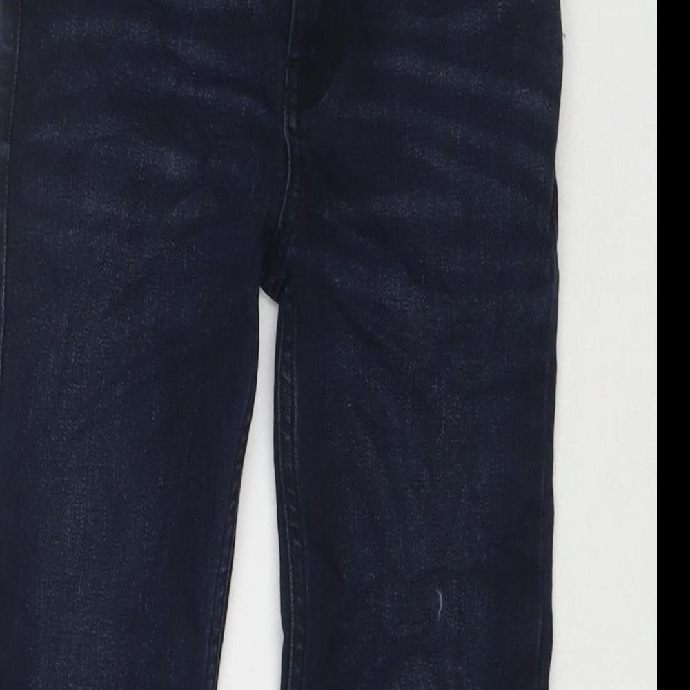 Close-up detail of Tu boys’ blue cotton skinny jeans, size 9, months, 21-inch leg regular zip