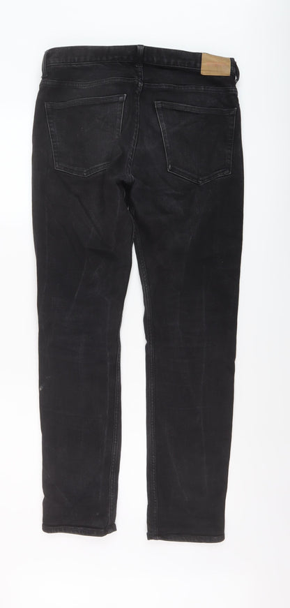 Back view of Easy men’s black cotton straight jeans, size 32, in, 30-inch leg regular button
