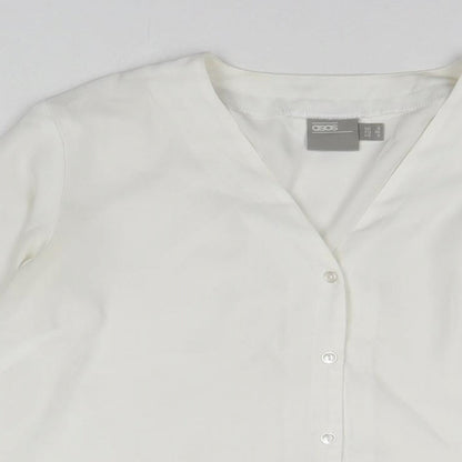 Close-up detail of ASOS women’s white polyester basic button-up, size UK 8, v-neck