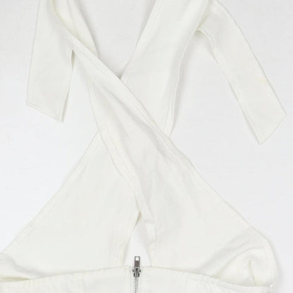 Brand and care label for Missguided women’s white polyester wrap tank, size UK 10, halter - cropped
