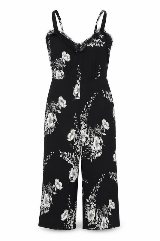 Front view of Miss Selfridge women’s black floral polyester jumpsuit one-piece, size UK 10, 21-inch leg zip