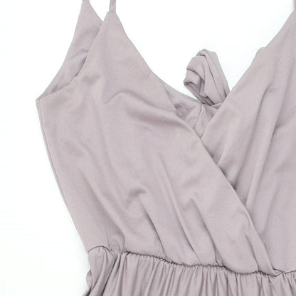 Close-up detail of ASOS women’s purple polyester a-line, size UK 12, v-neck tie