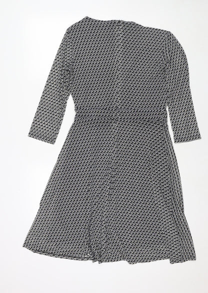 Back view of ESPRIT women’s black geometric polyester fit & flare, size M, v-neck zip