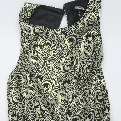 Close-up detail of Missguided women’s gold geometric polyester a-line, size UK 12, round neck button