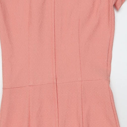 Brand and care label for ASOS women’s pink polyester mermaid, size UK 10, crew neck zip