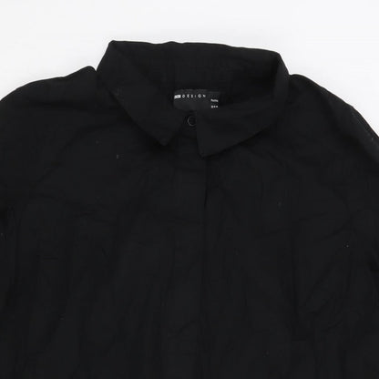 Close-up detail of ASOS women’s black cotton shirt dress, size UK 12, collared button