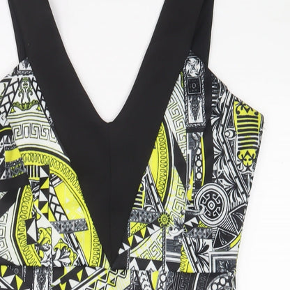 Close-up detail of Miss Selfridge women’s yellow geometric polyester a-line, size UK 12, v-neck pullover