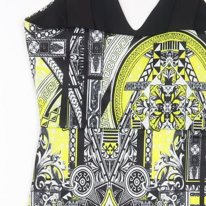 Brand and care label for Miss Selfridge women’s yellow geometric polyester a-line, size UK 12, v-neck pullover