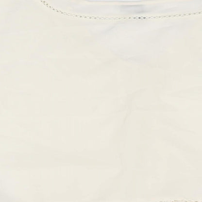 Brand and care label for ASOS women’s white polyester cropped blouse, size UK 8, v-neck