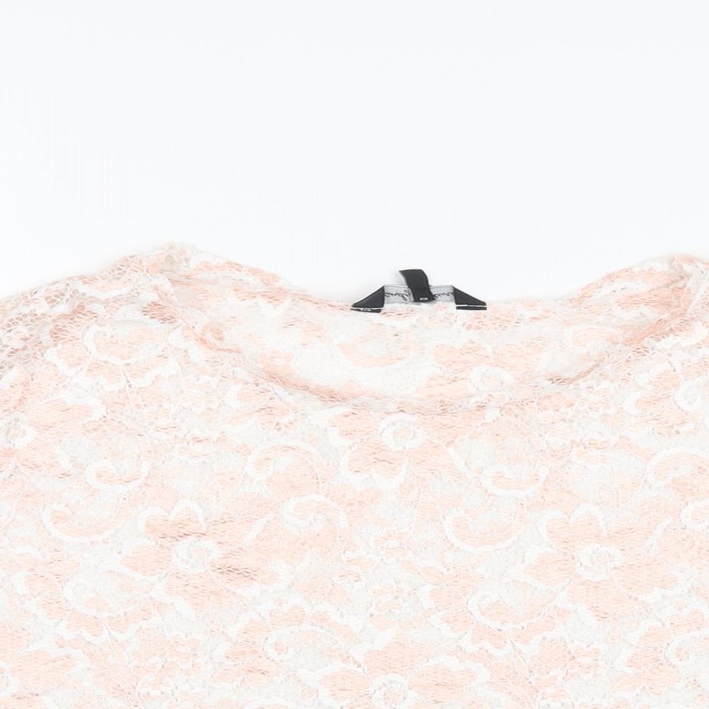 Close-up detail of Candy Couture girls’ pink floral polyester cropped t-shirt, size 15, years round neck pullover