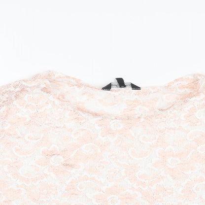 Close-up detail of Candy Couture girls’ pink floral polyester cropped t-shirt, size 15, years round neck pullover