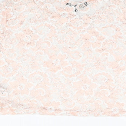 Brand and care label for Candy Couture girls’ pink floral polyester cropped t-shirt, size 15, years round neck pullover