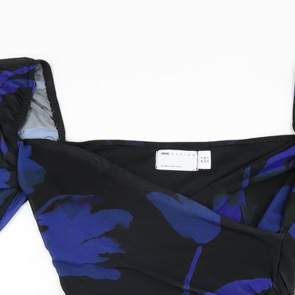 Close-up detail of ASOS women’s black floral polyester bodycon, size UK 6, sweetheart pullover