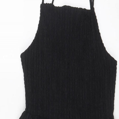 Close-up detail of ASOS women’s black polyester a-line, size UK 6, square neck pullover
