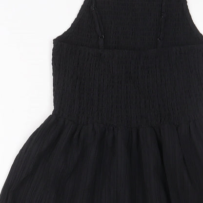 Brand and care label for ASOS women’s black polyester a-line, size UK 6, square neck pullover