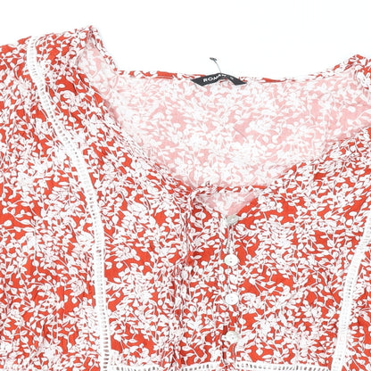 Close-up detail of Roman women’s red floral viscose basic blouse, size UK 16, v-neck