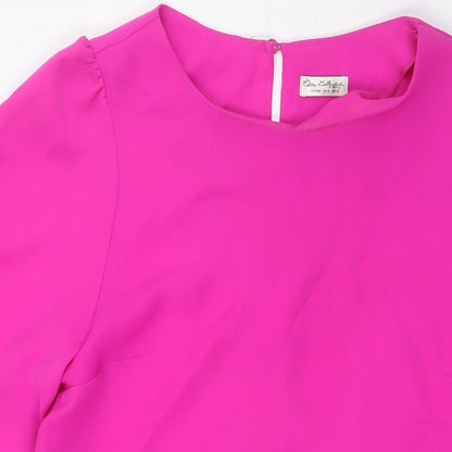 Close-up detail of Miss Selfridge women’s pink polyester a-line, size UK 12, boat neck button