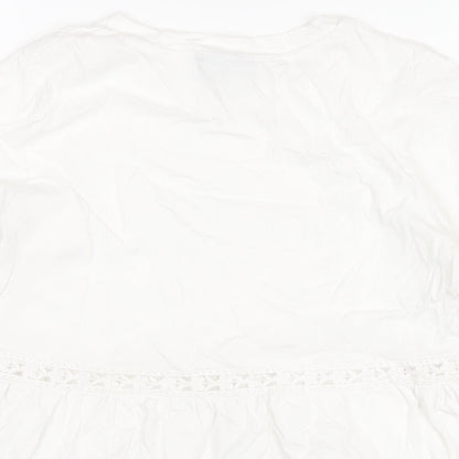 Brand and care label for ASOS women’s white cotton basic t-shirt, size UK 8, round neck