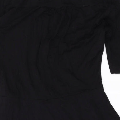 Brand and care label for ASOS women’s black viscose a-line, size UK 10, v-neck pullover