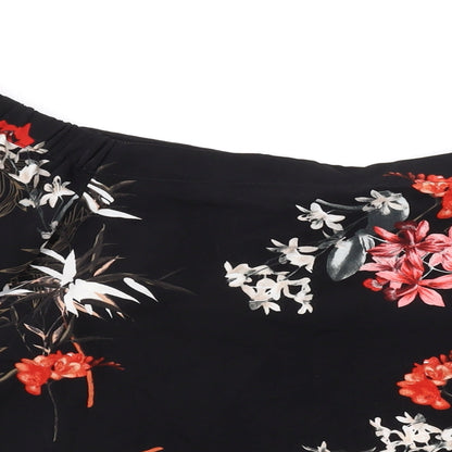 Close-up detail of Miss Selfridge women’s black floral polyester basic blouse, size UK 8, off the shoulder