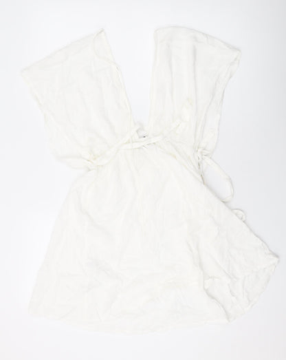 Back view of ASOS women’s white viscose mini, size UK 6, v-neck pullover