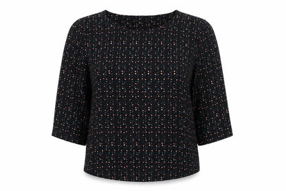 Front view of JDY women’s black polka dot polyester basic blouse, size UK 10, round neck