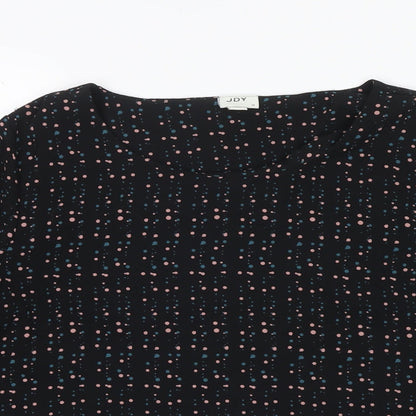 Close-up detail of JDY women’s black polka dot polyester basic blouse, size UK 10, round neck