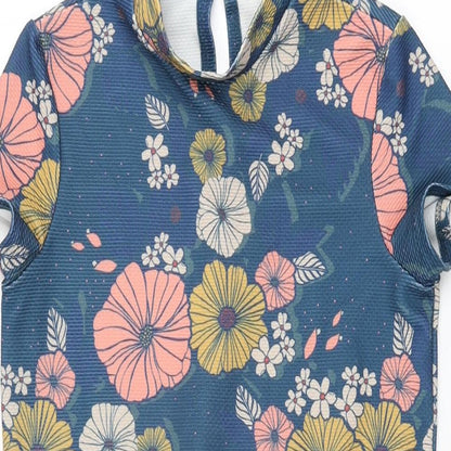 Close-up detail of ASOS women’s blue floral polyester mini, size UK 6, high neck button