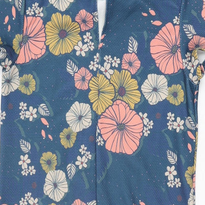 Brand and care label for ASOS women’s blue floral polyester mini, size UK 6, high neck button