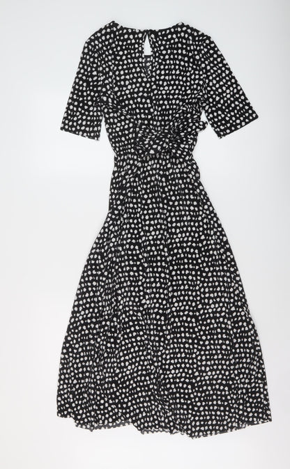 Back view of ASOS women’s black geometric polyester a-line, size UK 8, round neck button