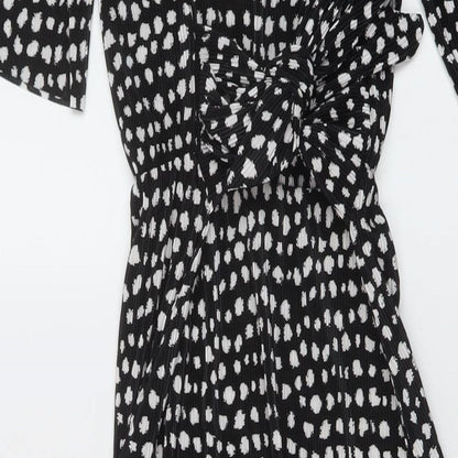 Brand and care label for ASOS women’s black geometric polyester a-line, size UK 8, round neck button