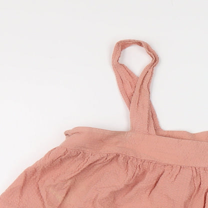 Close-up detail of ASOS women’s pink cotton basic blouse, size UK 16, square neck