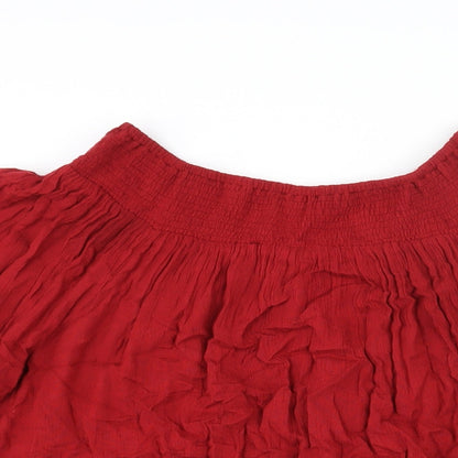 Close-up detail of Sfera women’s red polyester mini, size M, boat neck pullover