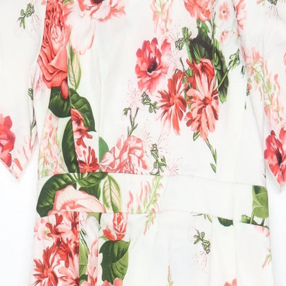 Close-up detail of ASOS women’s white floral polyester sheath, size UK 8, crew neck zip