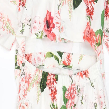 Brand and care label for ASOS women’s white floral polyester sheath, size UK 8, crew neck zip