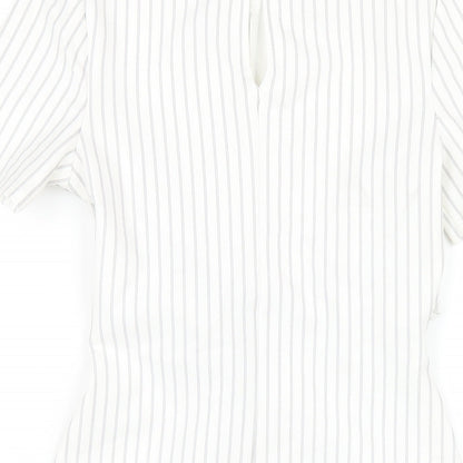 Brand and care label for Miss Selfridge women’s white striped polyester bodycon, size UK 6, round neck button