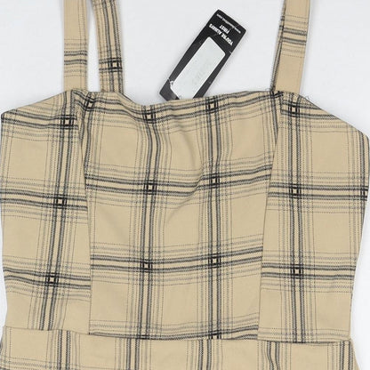 Close-up detail of I SAW IT FIRST women’s beige check polyester tank dress, size UK 14, square neck pullover