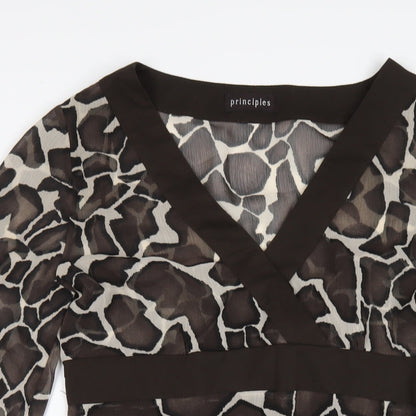 Close-up detail of Principles women’s brown geometric polyester a-line, size UK 10, v-neck zip