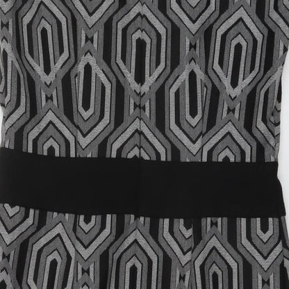 Brand and care label for Linea women’s black geometric polyester sheath, size UK 12, round neck zip