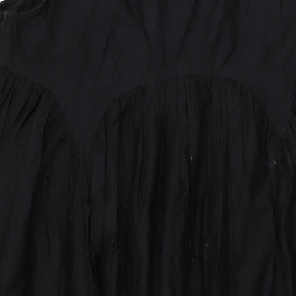 Brand and care label for ASOS women’s black cotton shift, size UK 16, scoop neck pullover