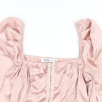 Close-up detail of Missguided women’s pink polyester cropped t-shirt, size UK 8, square neck
