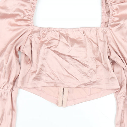 Brand and care label for Missguided women’s pink polyester cropped t-shirt, size UK 8, square neck