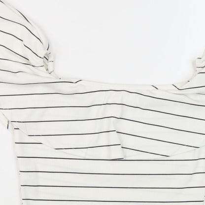Brand and care label for Missguided women’s white striped polyester cropped blouse, size UK 10, round neck