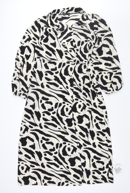 Front view of ASOS women’s ivory geometric polyester wrap dress, size UK 12, collared tie